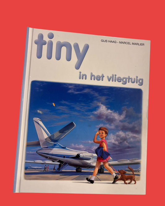 Tiny in het vliegtuig