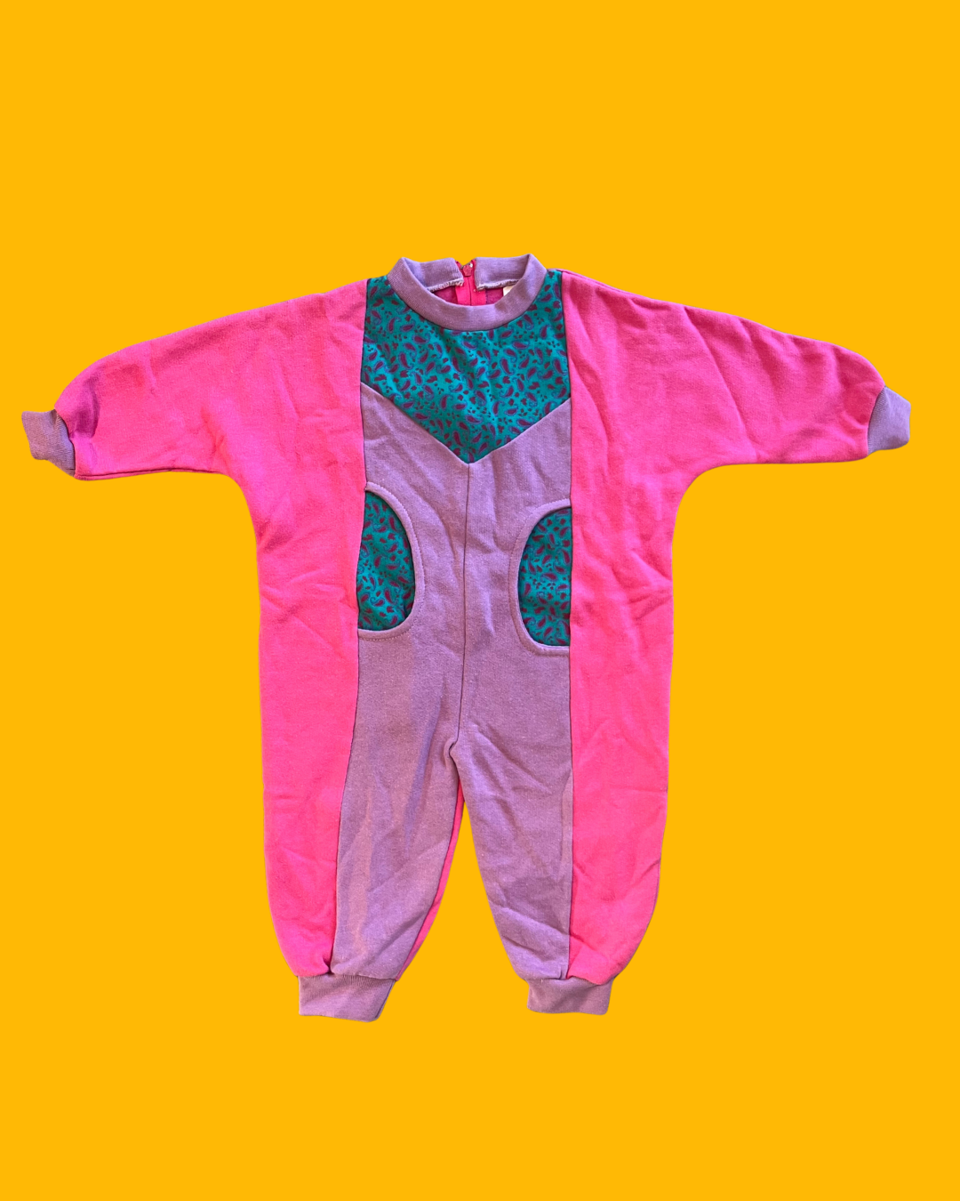 Kleurrijke onesie maat 80