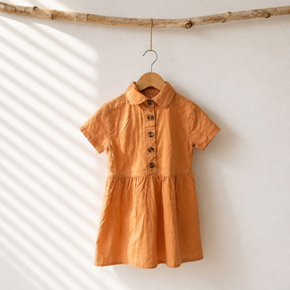 Pastel Oranje kleedje 2 jaar