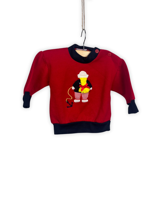 Rood truitje met schattig figuurtje op de buik maat 74